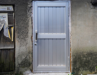 Architectural elements connecting exterior and interior spaces, showcasing various door designs.