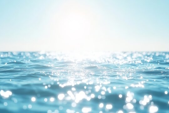 Sparkling ocean water surface with sunlight reflections.