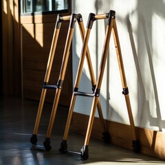 Wooden Tripod Stand for Photographic Use Enhancing Stability with Sunlit Background, Perfectly Captured in a Modern Indoor Setting for Creative Projects