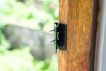 Close-up of a Wooden Door Latch