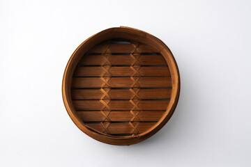 Close-up photo of Wooden dimsum steamer container isolated on white background. Shot on 30 Degree, flat lay angle setup