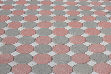 this stock photo showcases an interlock paving pattern, highlighting pavement design and paving...