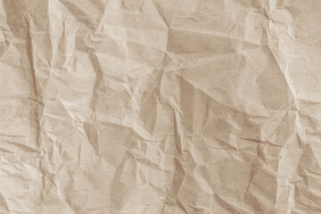 Crumpled brown paper texture background for design with copy space for text or image.	