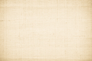 Closeup detail of beige fabric texture background. High resolution photo.