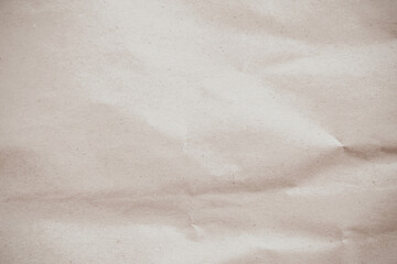 Naklejka premium Crumpled brown paper texture background for design with copy space for text or image.