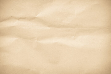 Naklejka premium Crumpled brown paper texture background for design with copy space for text or image.