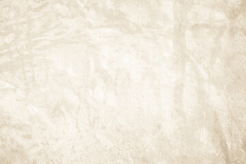 Fototapeta premium Dark old concrete wall texture background. Close Up retro plain cream color cement wall background texture. Design paper vintage parchment element show or advertise or promote product on display.