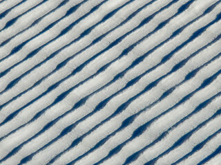 Snow-covered roof, covered with monk and nun tiles.