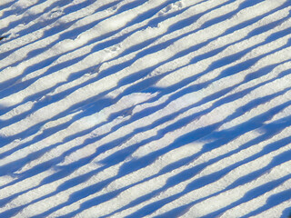 Snow-covered roof, covered with monk and nun tiles.