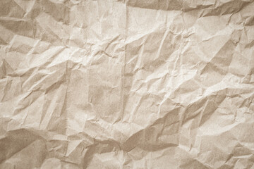 Crumpled brown paper texture background for design with copy space for text or image.