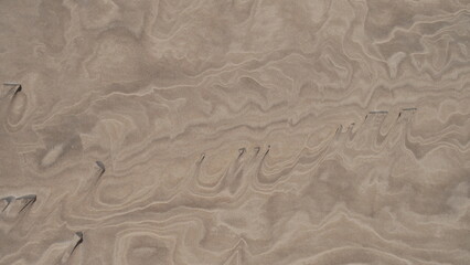 Photo paradisiaque de dunes de sable dans le désert avec lacs eau turquoise, Parc Lençois Maranhenses, Brésil