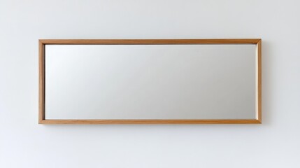 Obraz premium Minimalist wall-mounted mirror with a wooden edge, reflecting a seamless white background, elegant and understated.
