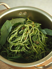 Pesto spaghetti with Thai basil and cashew nuts