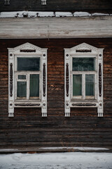 old Russian houses with carved window frames