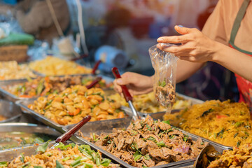 Street foods of Thailand, foods style of a variety of dishes for the party at night market