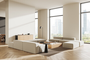 Modern minimalist living room with modular beige sofas, wooden flooring, and cityscape view through large windows. 3D Rendering