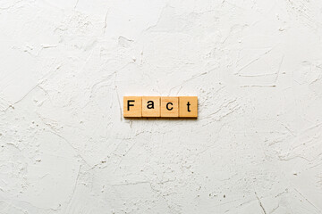 extrovert word written on wood block. extrovert text on table, concept