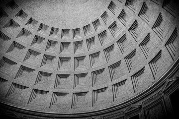 Architectural details of the Pantheon dome in Rome, showcasing intricate patterns and historical craftsmanship © rik85