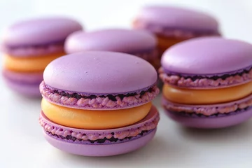Wall murals Lavender macarons or macaroons in pastel shades in a minimalist French patisserie. French sweets culinary website or blog, cooking class, food products brands, confectionary ads
