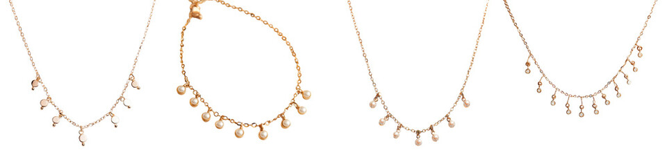 Fototapeta premium Collection of elegant gold necklaces featuring delicate pendants and chains perfect for adding a touch of timeless style and sophistication to any outfit These minimalist