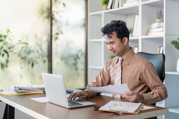 Business professional working at desk modern office digital workspace bright environment focused viewpoint productivity concept