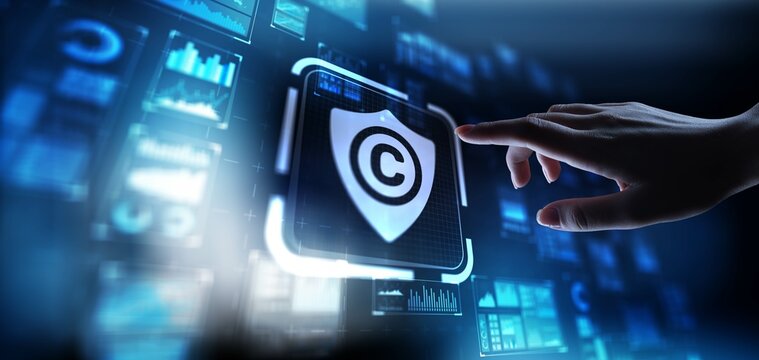 Copyright Protecting Creative Works and Intellectual Property, projection on a virtual screen, Business and Technology Concept.