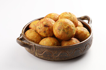 paniyaram, a Southindian dish made from fermented batter,Paniyaram, Kuzhi paniyaram Gunta ponganalu paddu, guliyappa made of black lentils and rice snack