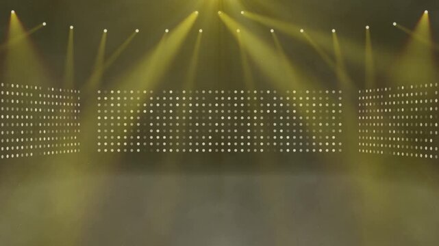 黄色いライトが動くライブステージ