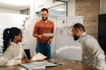 Managers discussing business strategy during a meeting