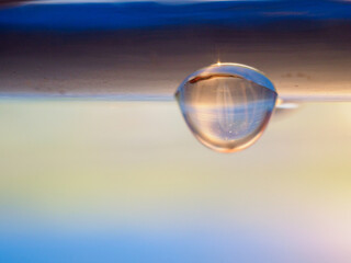 Water drops on stainless steel fence