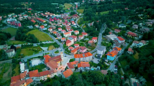 4K Aerial Drone Video of Villas and Farmhouses in the Village of Cavallasca, Italy on a Summer Evening