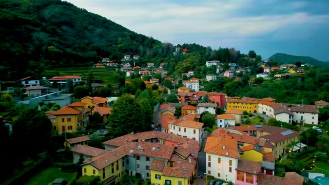 4K Aerial Drone Video of Mountainside Farmhouses in Cavallasca, Italy on a Summer Evening
