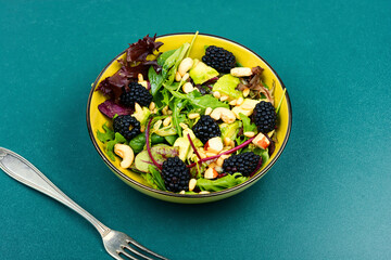 Plate of colorful fresh salad.