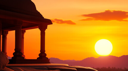 Fototapeta premium A breathtaking sunset casting warm hues over rolling hills and an elegant architectural structure, creating a serene ambience.