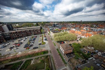 Fototapeta premium View of Zevenbergen showing urban development and greenery alongside bustling streets