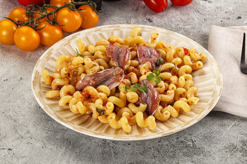 Italian pasta cellentani with anchovy