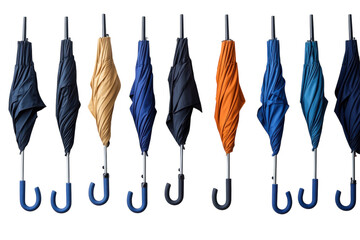 Colorful collection of umbrellas hanging in a row against a white backdrop in a retail display setting