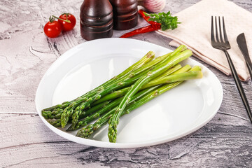 Vegan cuisine - Boiled asparagus with oil