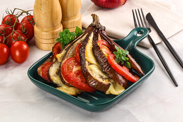 Baked tomato with mozzarella and tomato