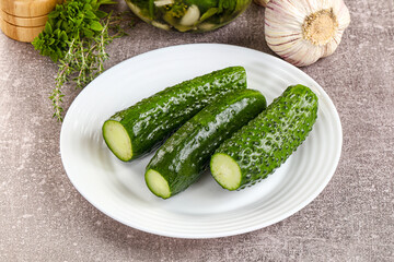 Homemade lighty salted cucumbers with herbs