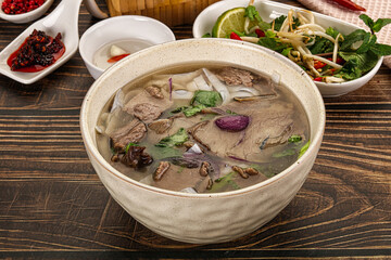 Vietnamese Pho Bo soup with beef and noodles