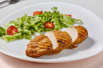Grilled Chicken Fillet with Fresh Mixed Salad on White Plate