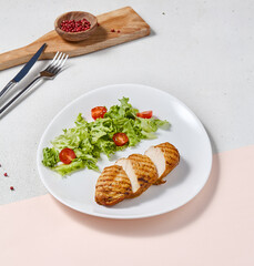Grilled Chicken Fillet with Mixed Salad on White Plate - Minimalist Culinary Photography