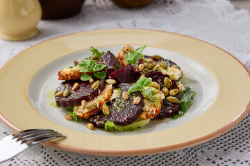 Gourmet Roasted Beet Salad with Cheese and Pine Nuts Vibrant Colors and Elegant Composition