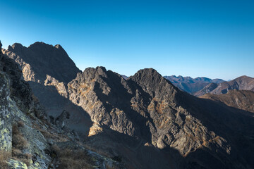 Obraz premium Picturesque landscape of the mountain peaks of the High Tatras. 