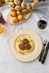 Elegant Veal Medallions with Creamy Mashed Potatoes A Culinary Art Photography