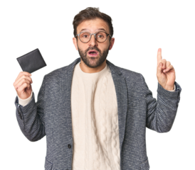 Hispanic male with briefcase in studio having some great idea, concept of creativity.