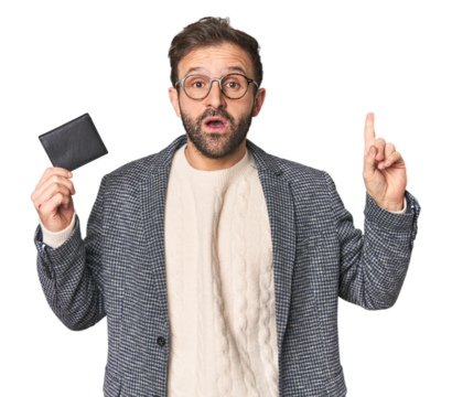 Hispanic male with briefcase in studio having some great idea, concept of creativity.