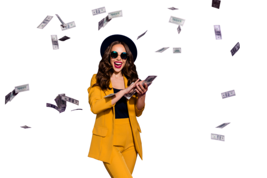 Portrait of her she nice attractive cheerful cheery positive trendy luxury wavy-haired lady throwing 100 hundred million expenses isolated over bright vivid shine violet lilac background