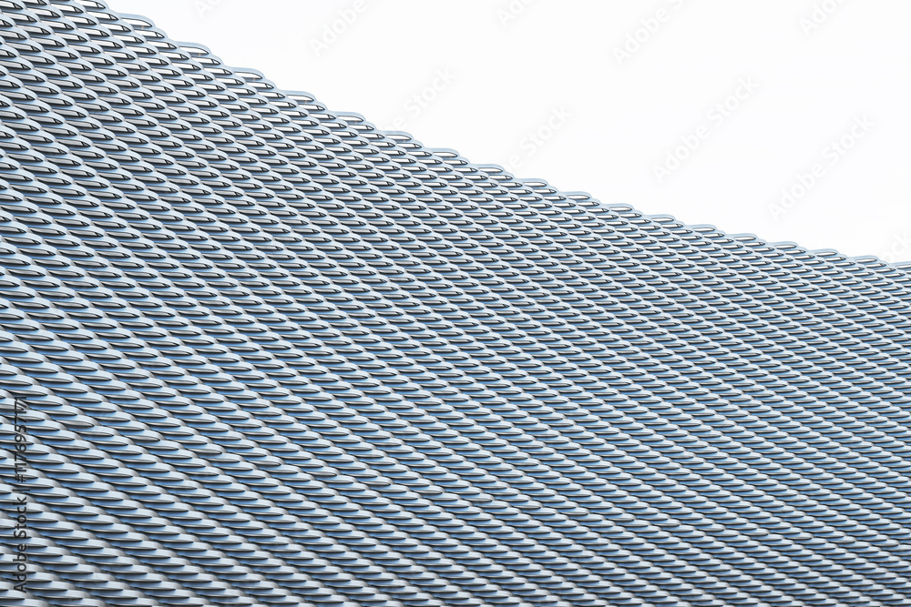 Aufkleber Abstract architectural pattern of repeating metallic elements on a white background. 3D Rendering